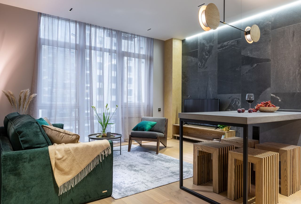 Sleek and luxurious living room with modern furnishings and elegant decor.